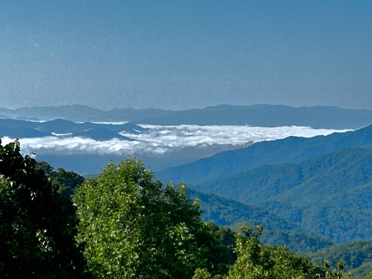 Clouds rolled like a whitewater river in the valleys below the Smoky Mountain peaks.